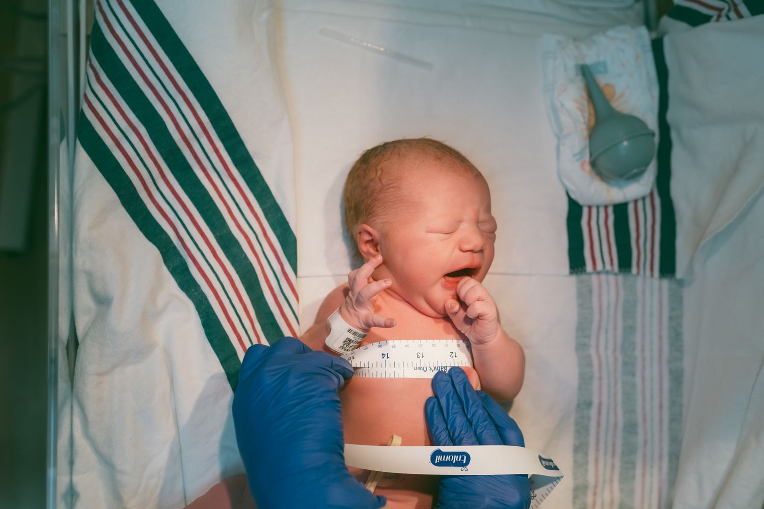 The details that a birth photographer in Fort Sill, Oklahoma will stay around through out the weight check and measurements to preserve.