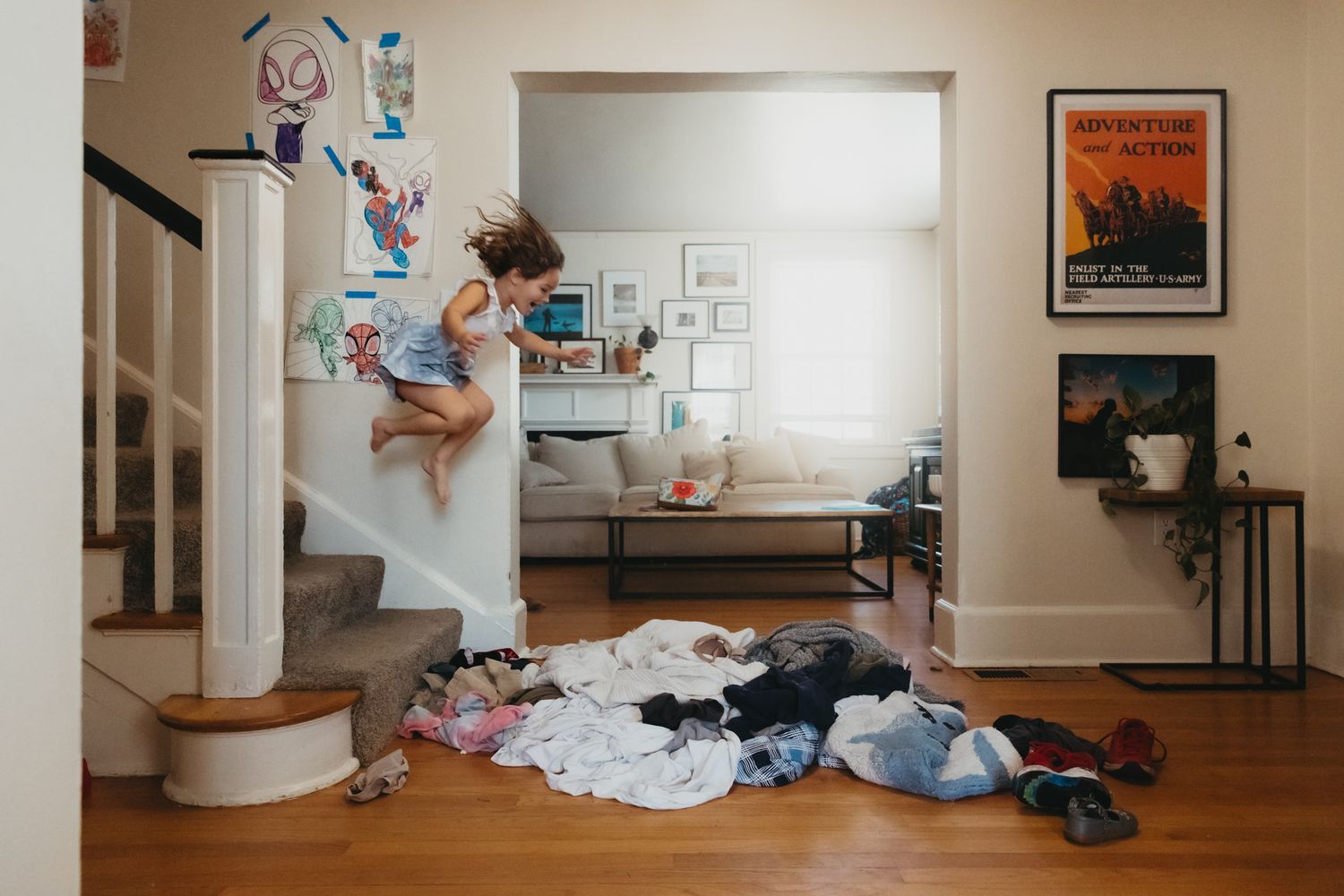 Wide view of living room interior with scattered toys and everyday life details.