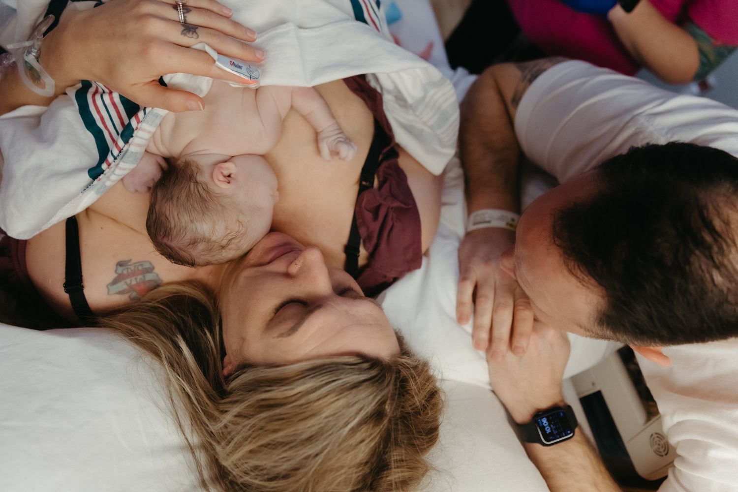 A collection of images showing close-up tender moments between parents and their newborn babies.