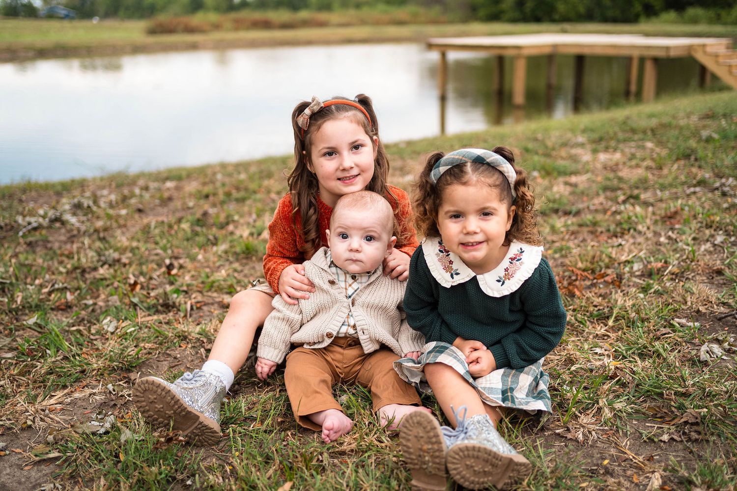Kids smile at the camera during their photo session in Blue Springs