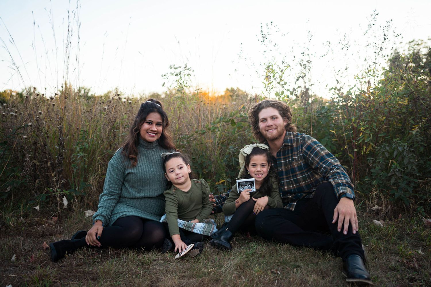 Warrensburg maternity photographer specializing in newborn, family, and milestone photos