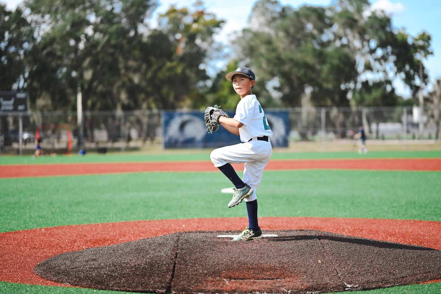 Baseball pitching mound sequence showing different angles and positions on the field.