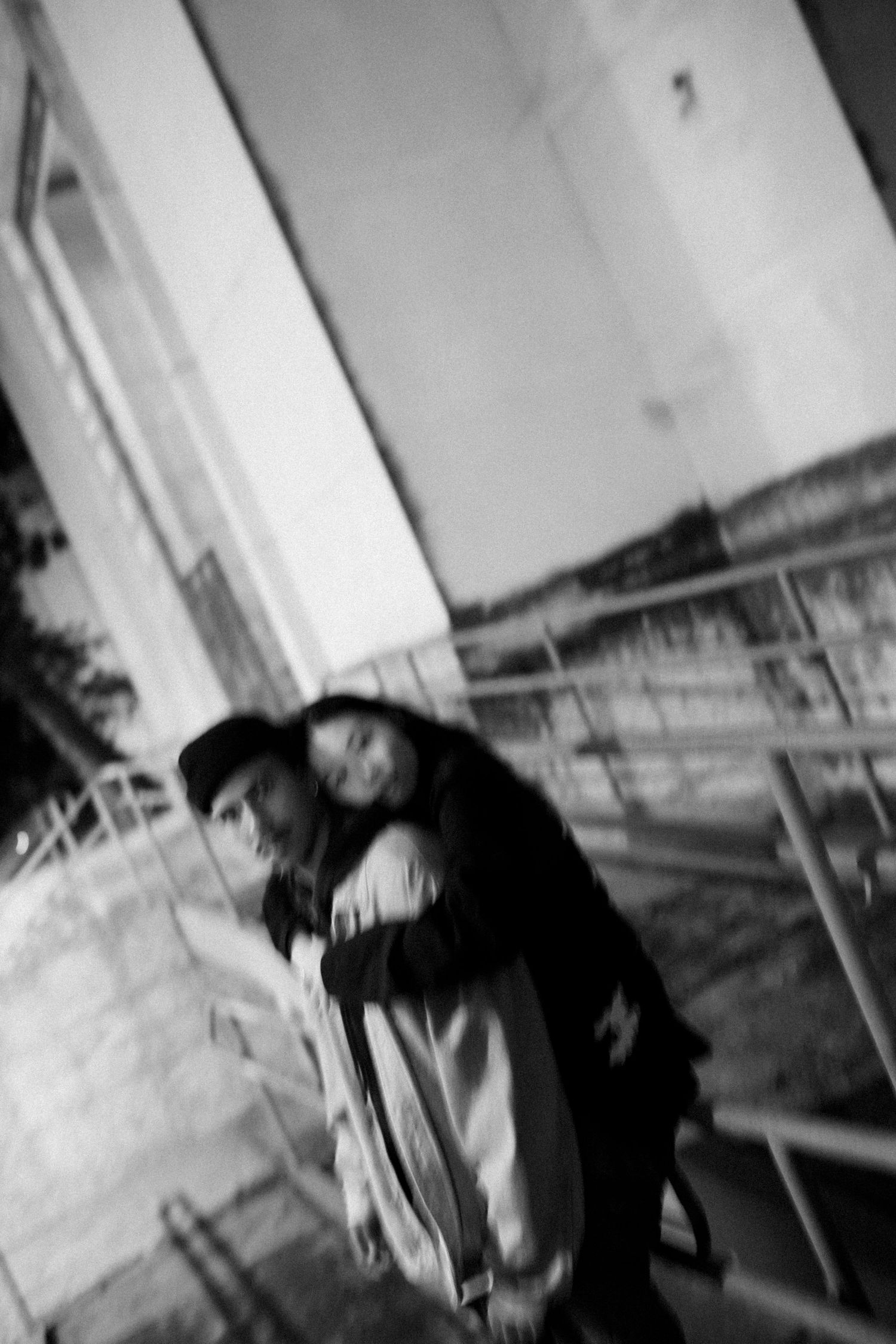 Artistic blurred motion shots in black and white showing dynamic movement.