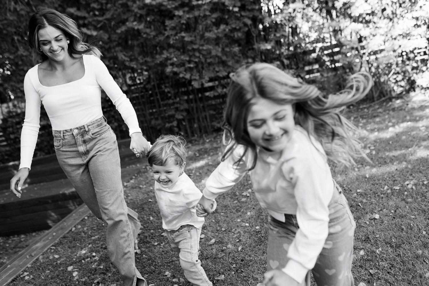 Playful movement captured in a garden setting with natural lighting.