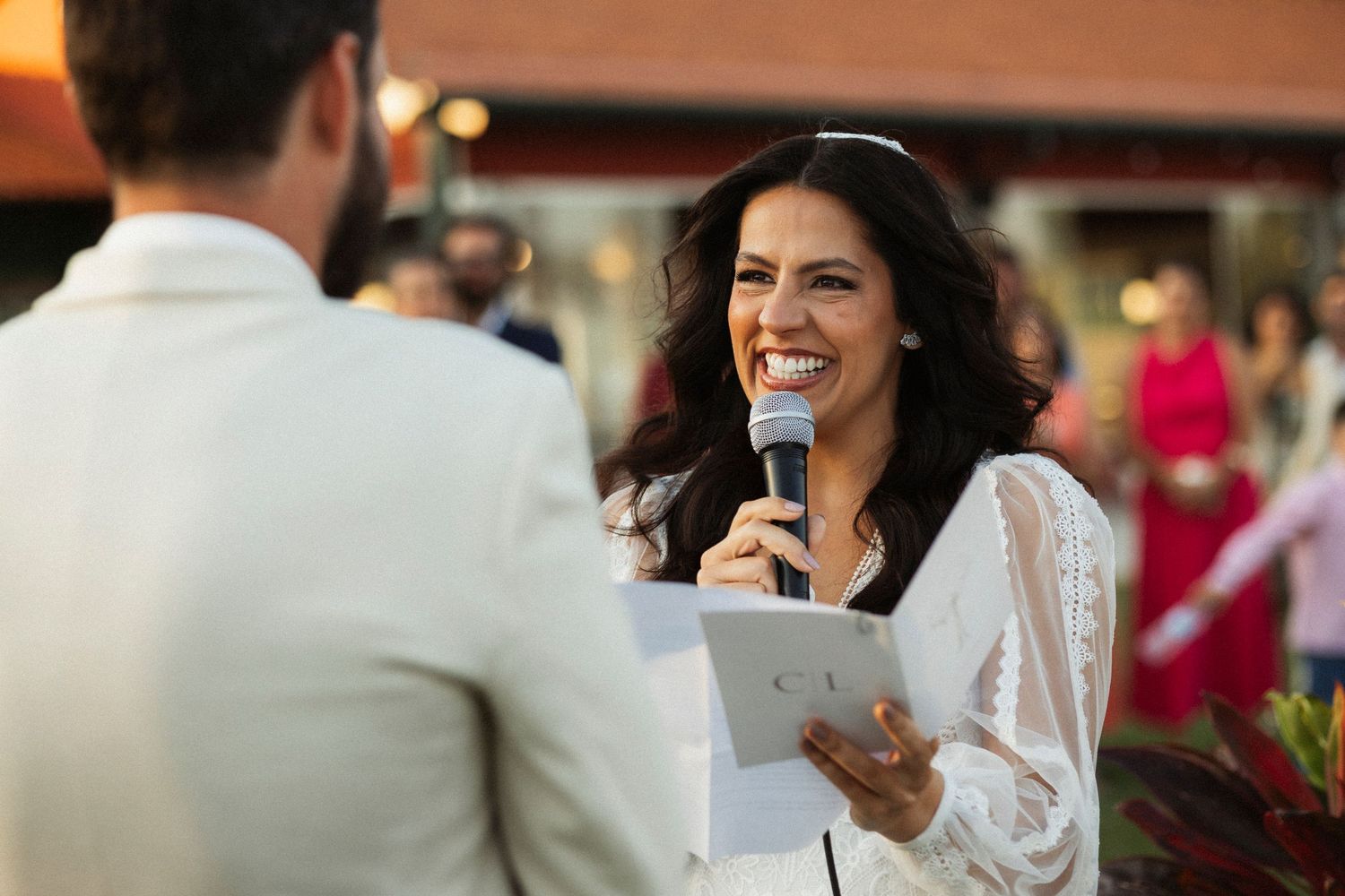 Candid moments captured during outdoor wedding reception festivities.