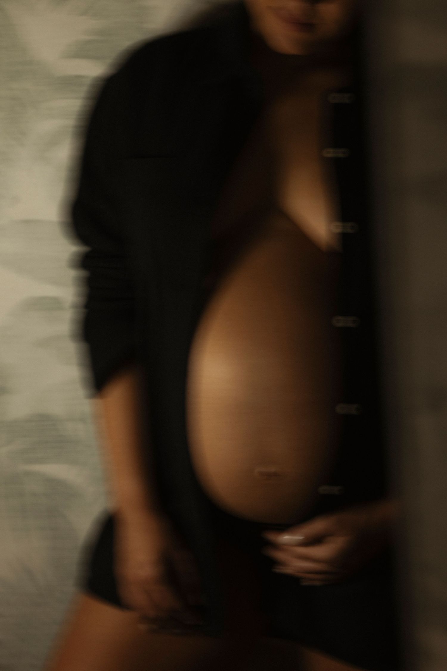 Artistic sequence showing intimate moments in moody lighting.