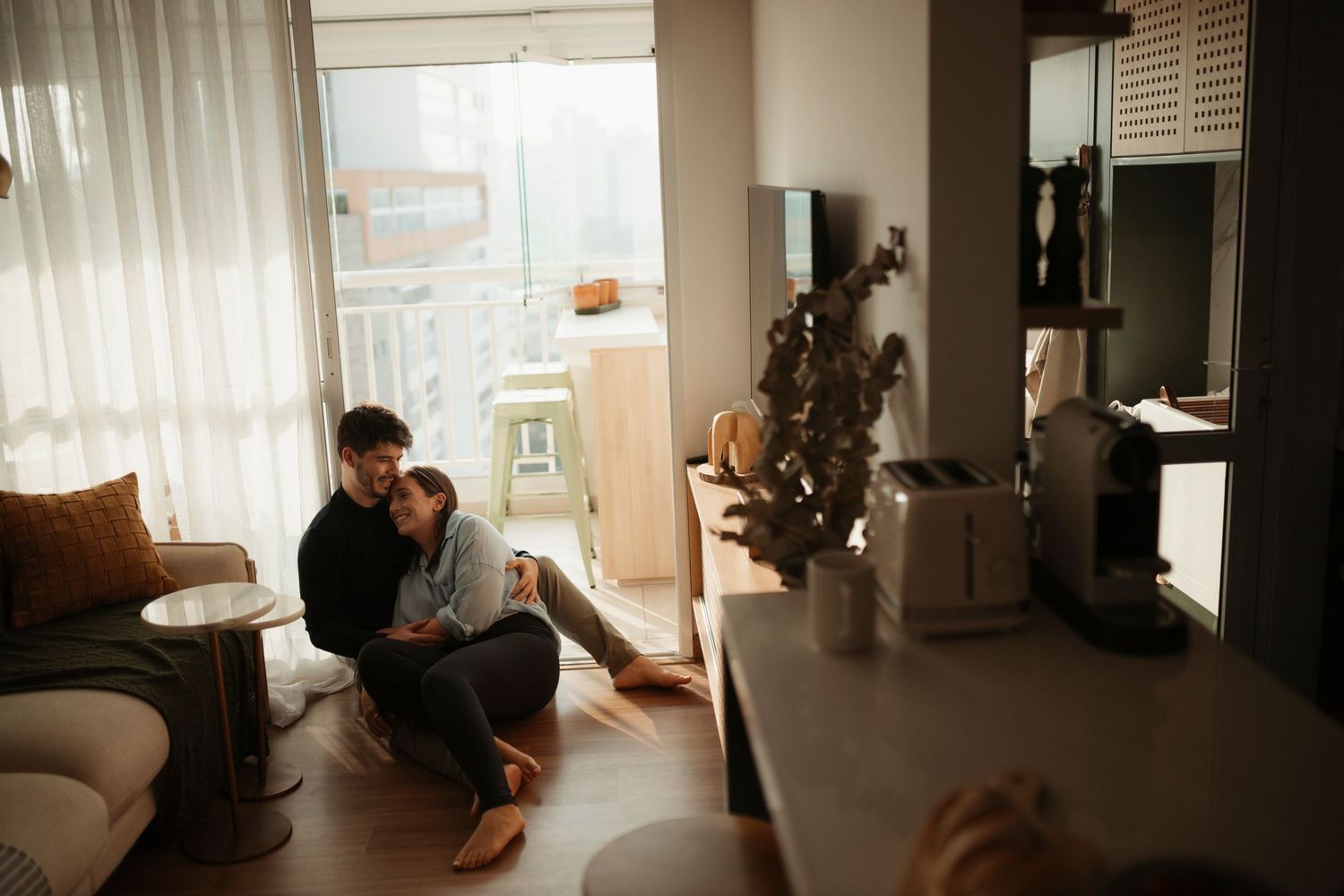 Minimalist home interior scenes with natural lighting and modern furniture.