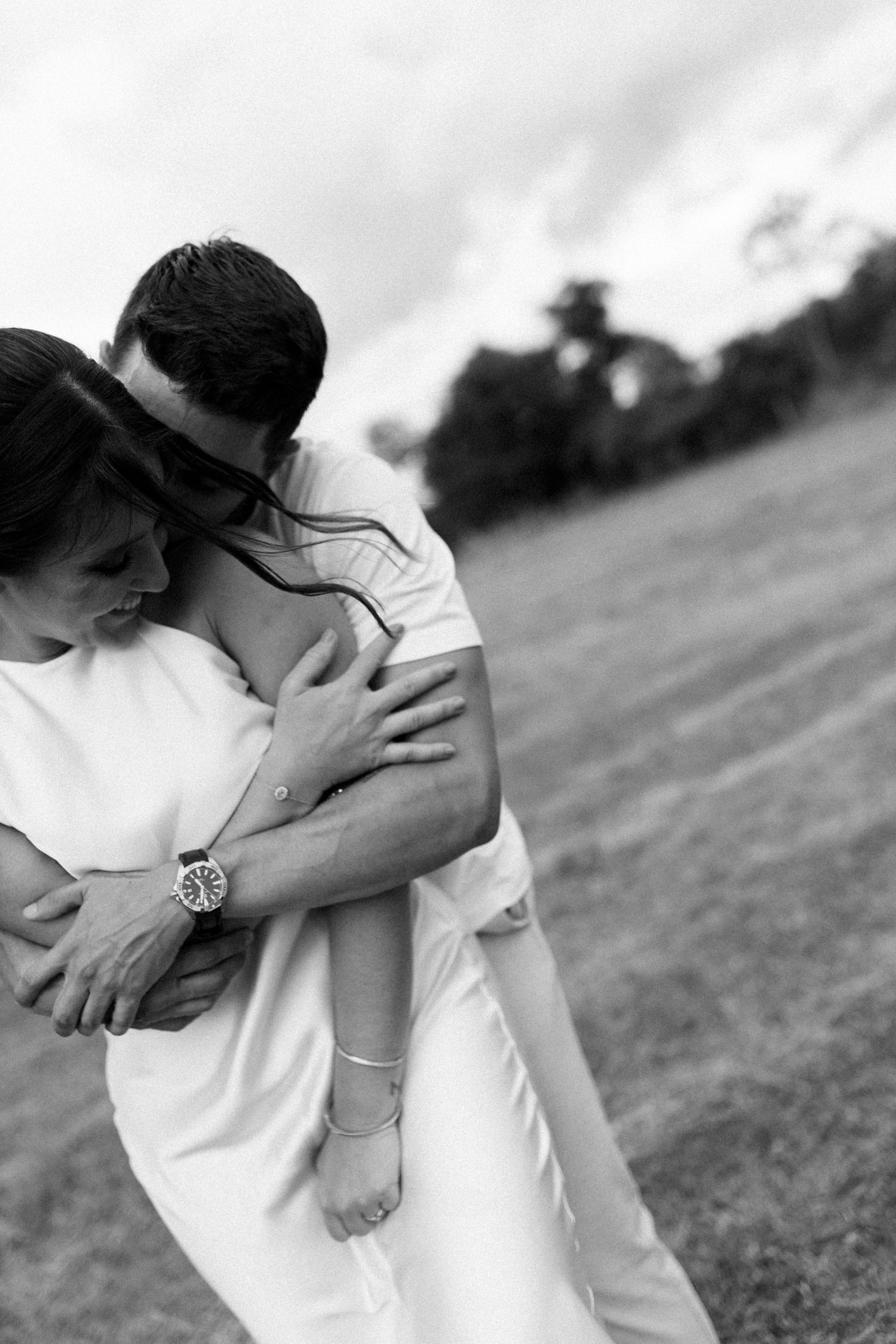 Black and white romantic sequence showing intimate moments between a couple.