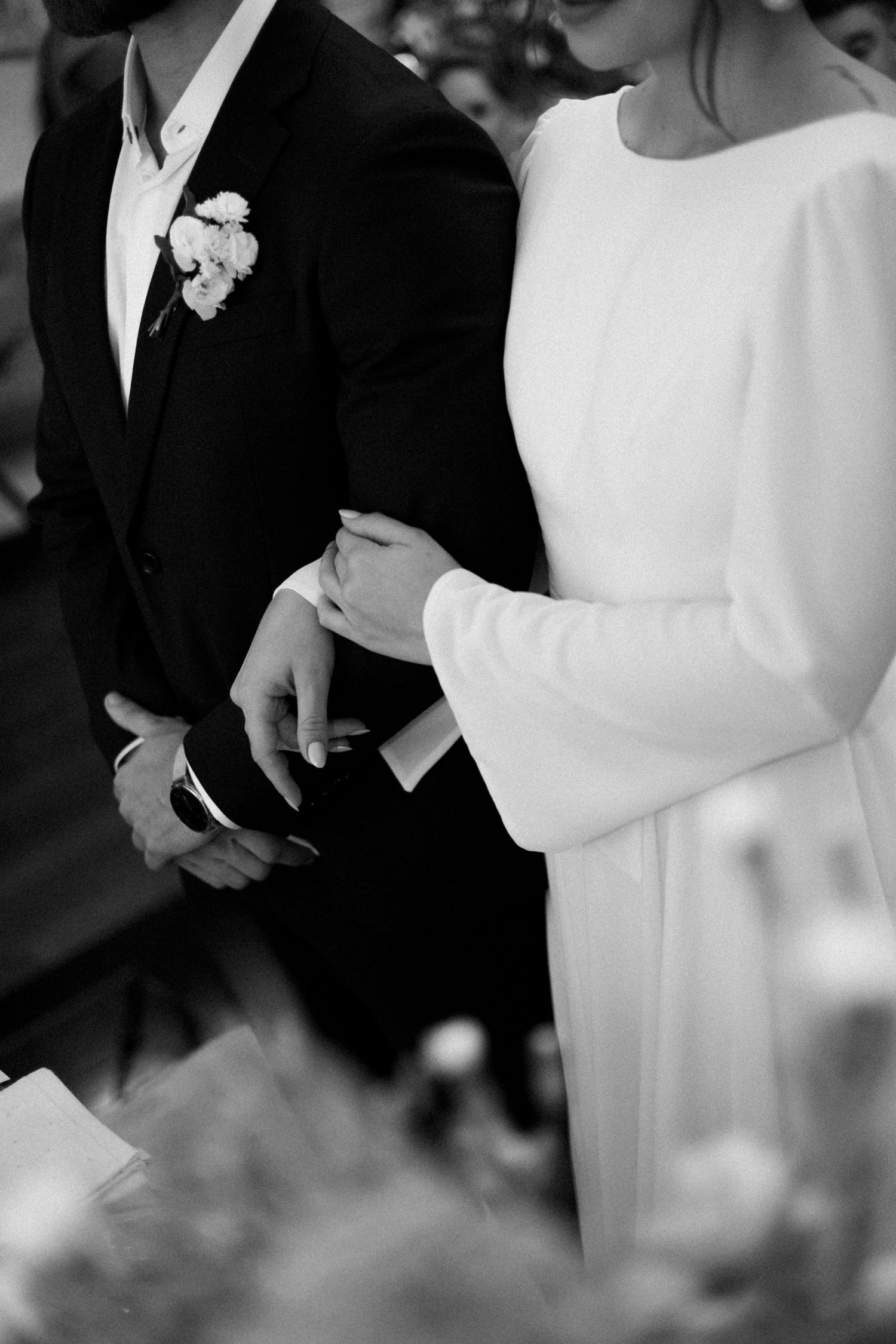 Elegant black and white wedding photography capturing intimate moments between the couple.