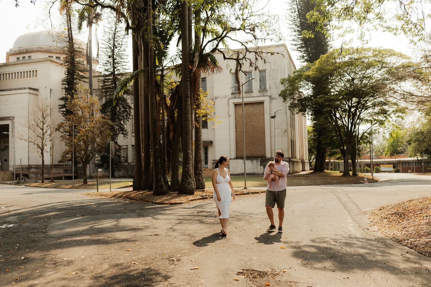 A series of outdoor shots showing people walking along a sunlit urban pathway.