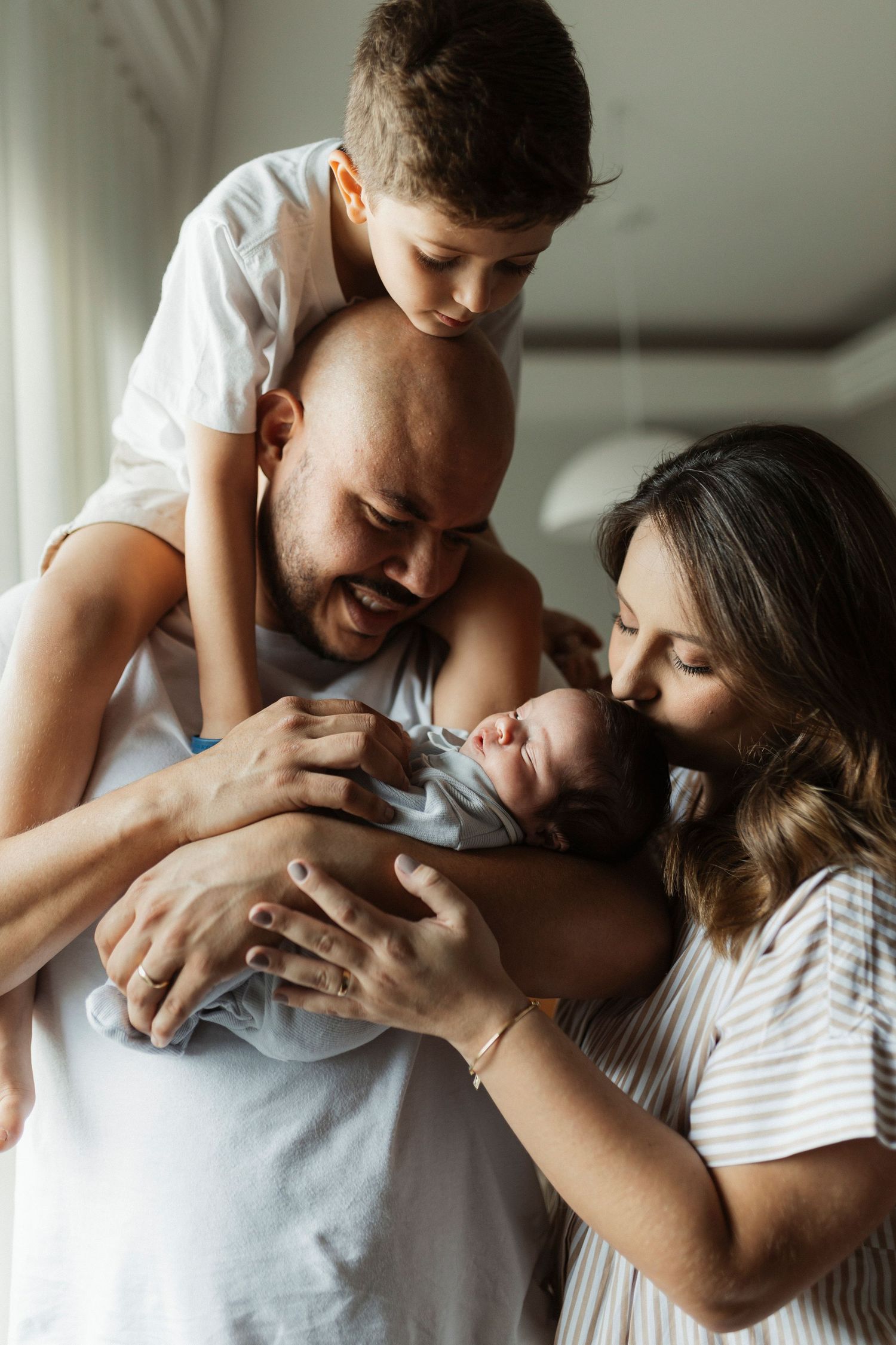 Intimate family moments captured in a sequence of joyful interactions.