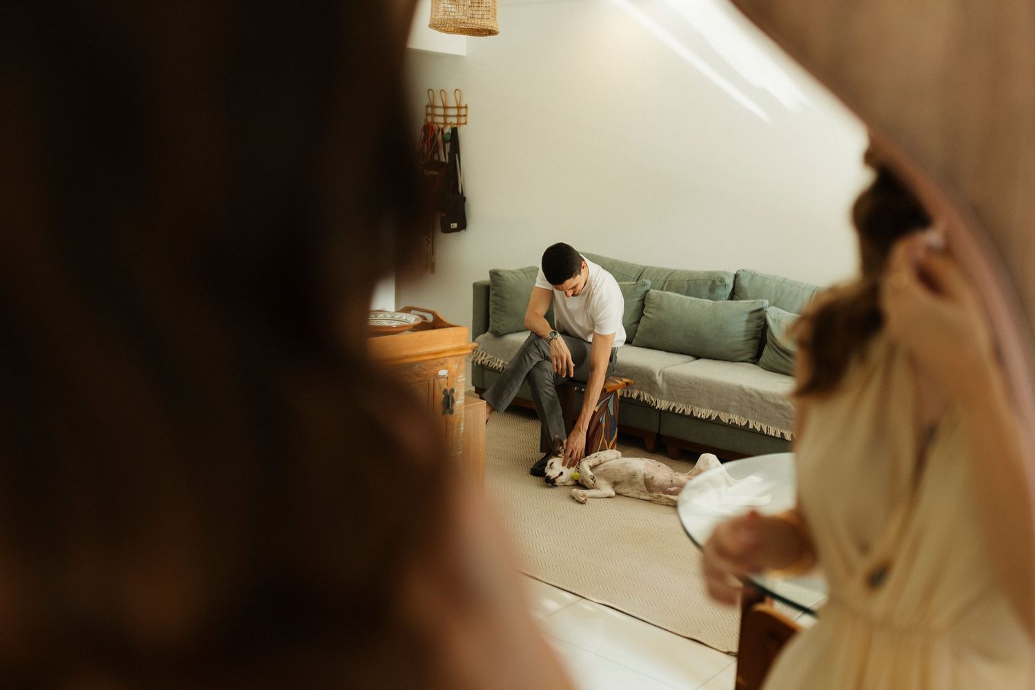 Intimate indoor moments captured in soft focus and warm lighting.