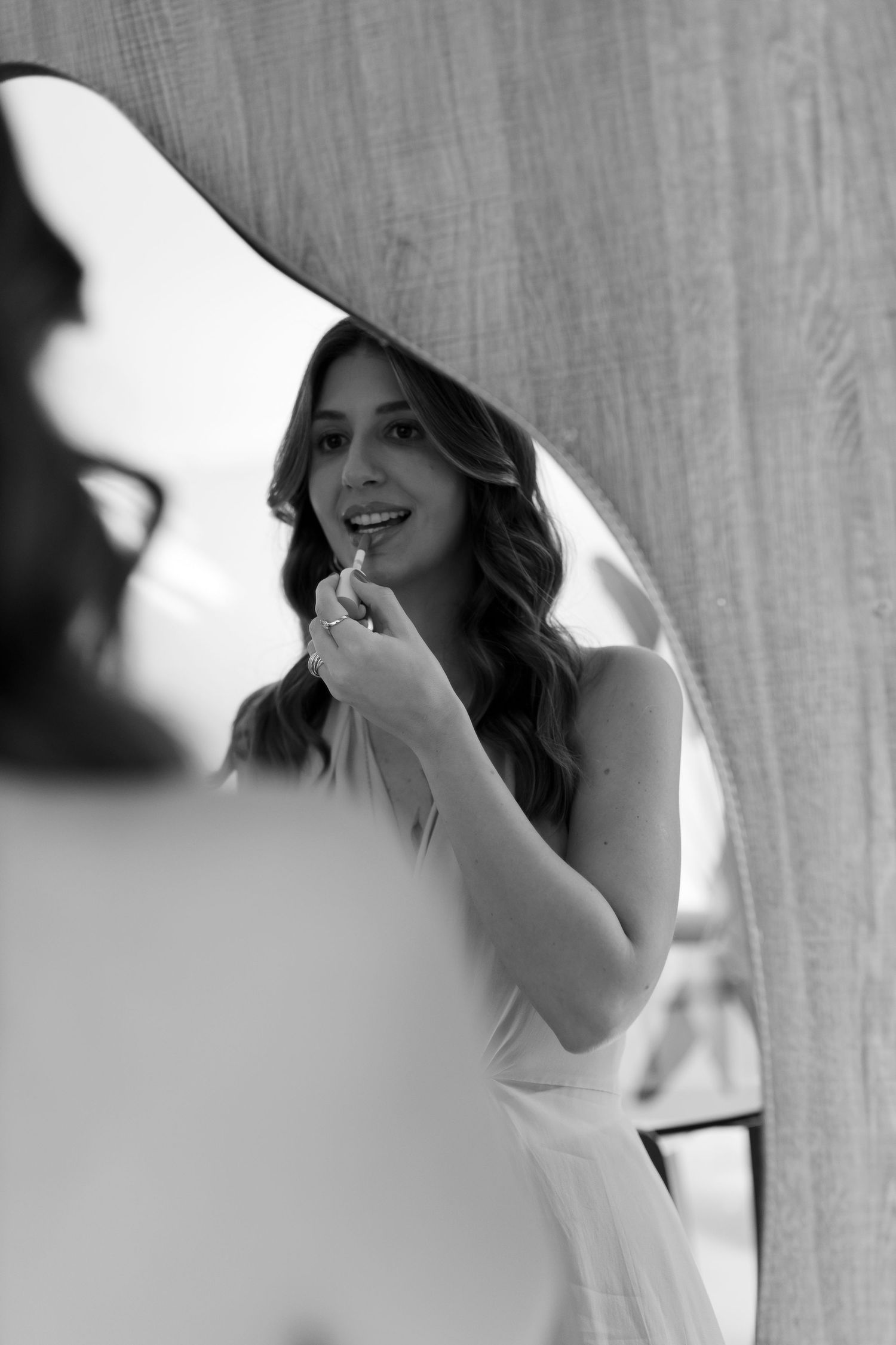 Black and white artistic sequence showing moments through sheer curtain.
