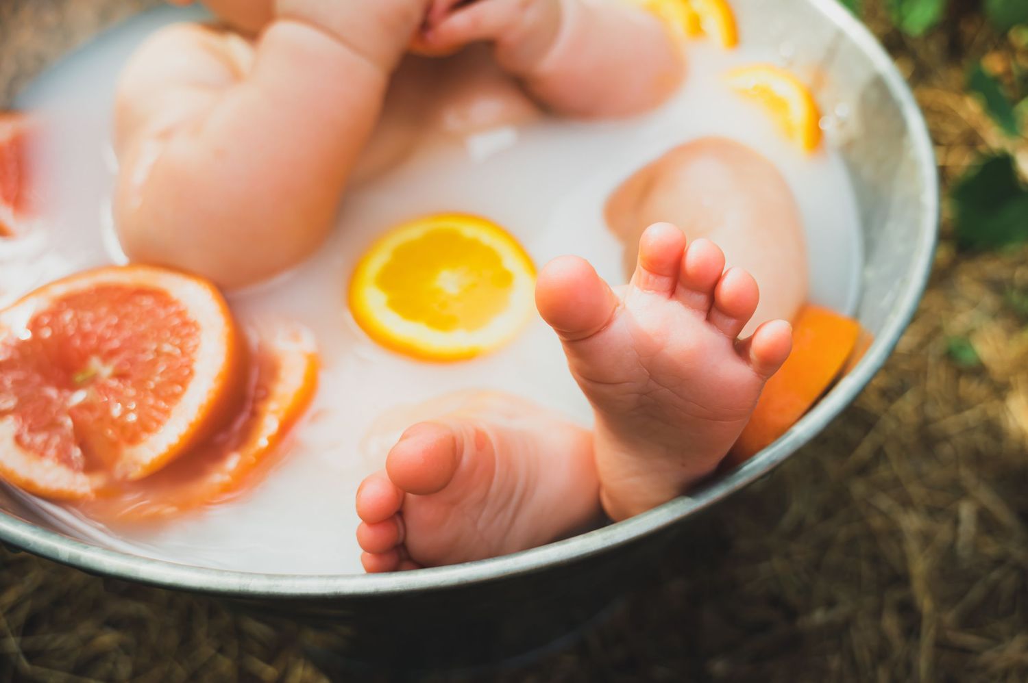 Milk bath detail photograph in Yulee, FL with detailed photo of baby feet