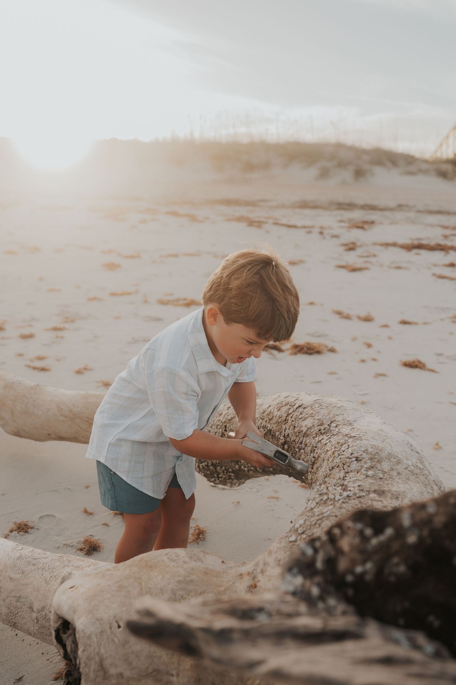 Little boy playing at the beach in Fernandina Beach, Florida