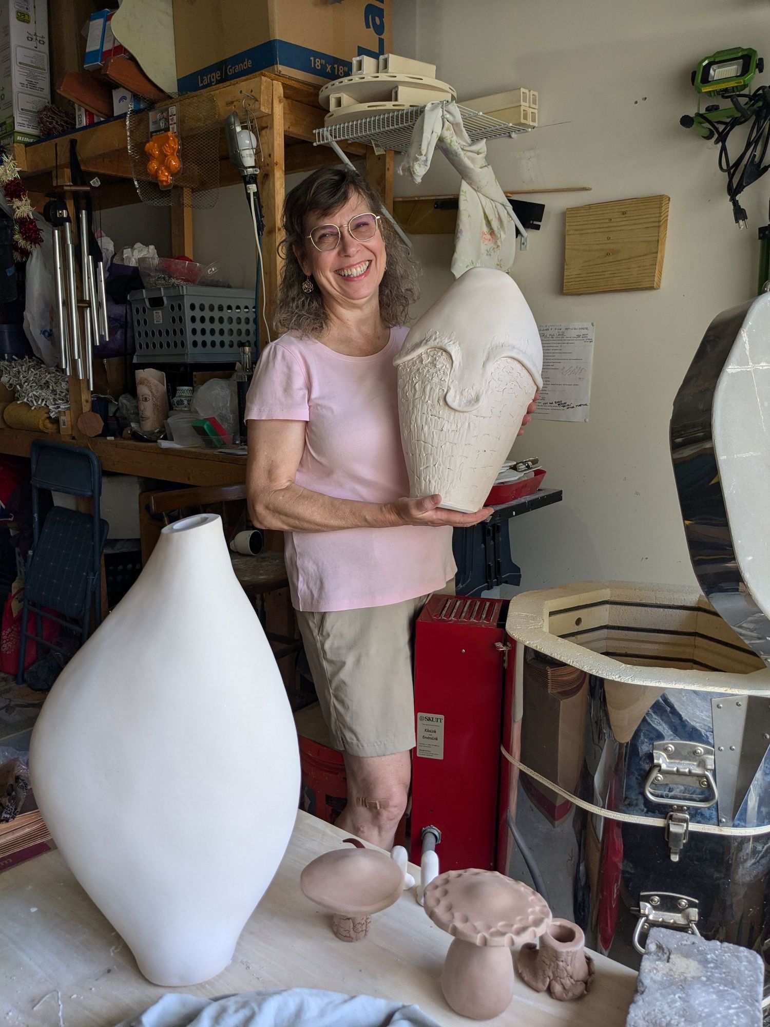 Artist in her kiln room.