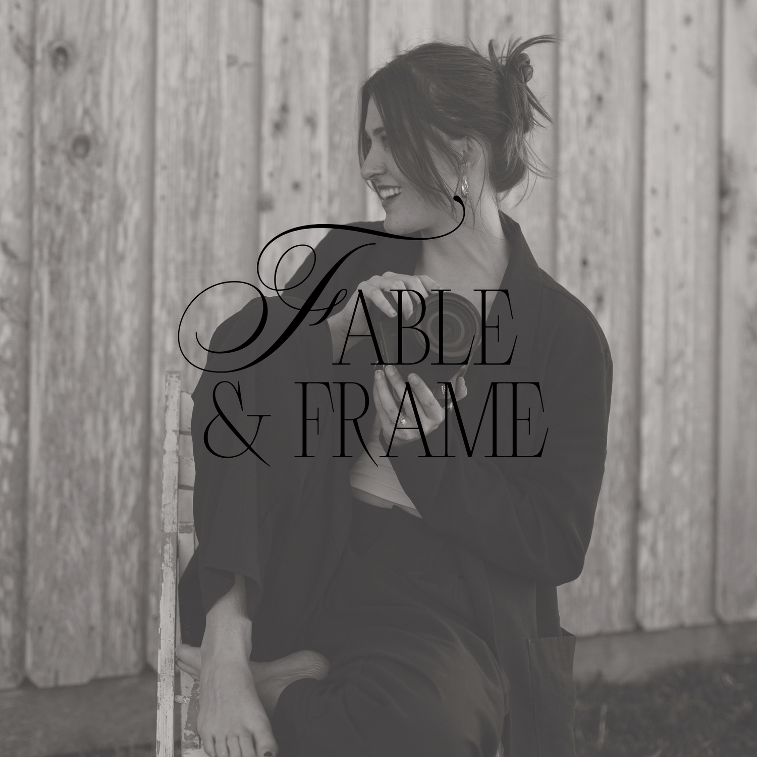 Fable and Frame photography logo overlaid on black and white image of smiling woman outdoors.