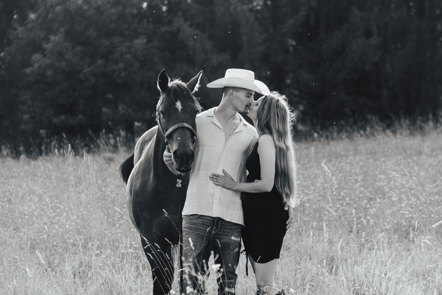 Summer Photo of Couple with a Horse