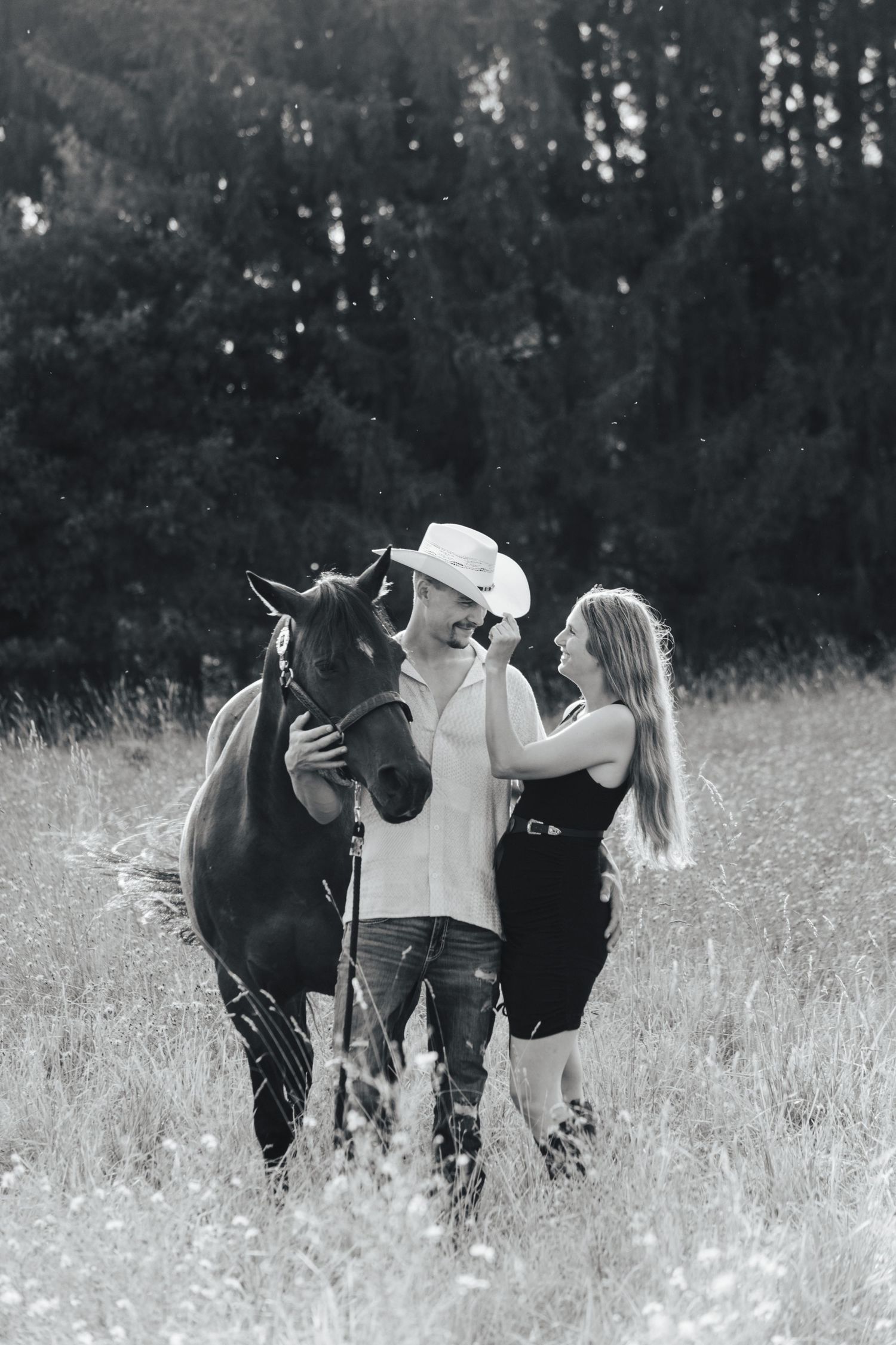 Summer Photo of Couple with a Horse