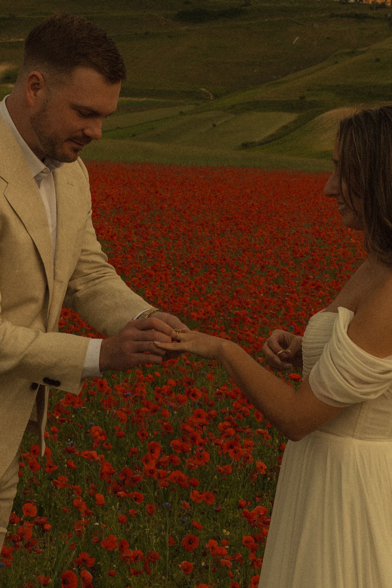 Exchanging the rings, elopement in Castelluccio di Norcia, Umbria, Italy