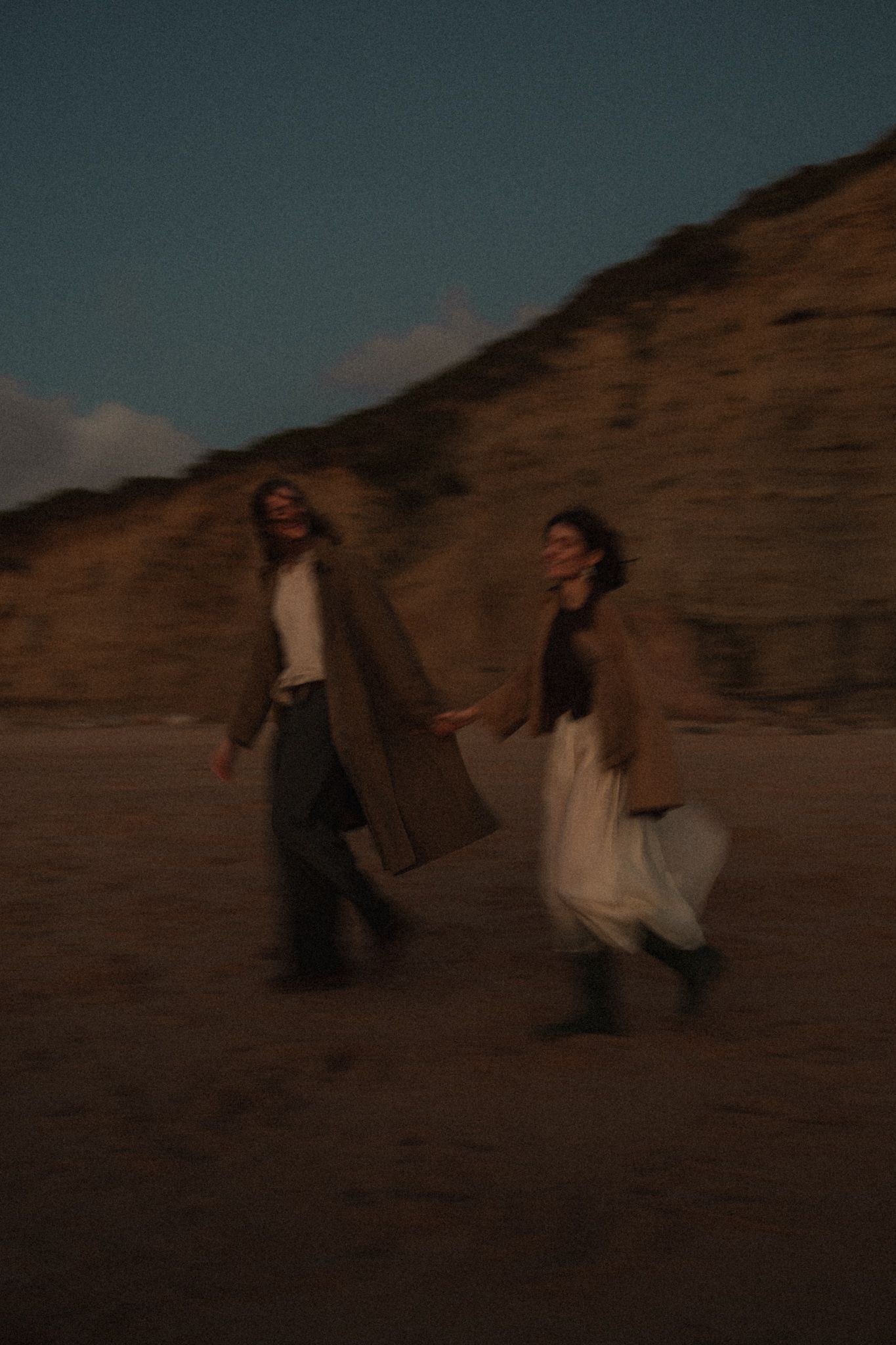 Walk along the shoreline, coastal Portugal couple session