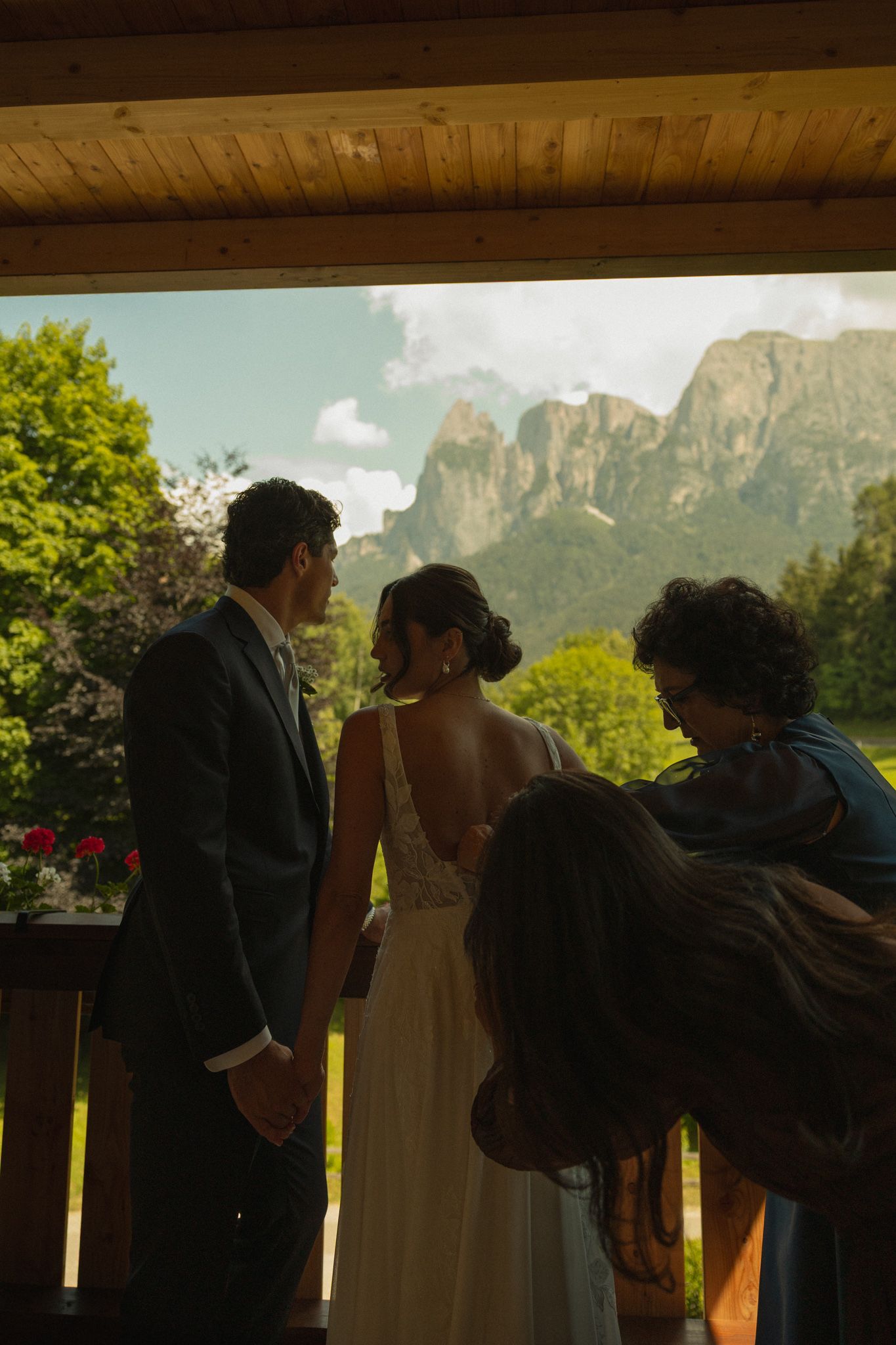 Bride getting ready with Dolomites mountains in the background