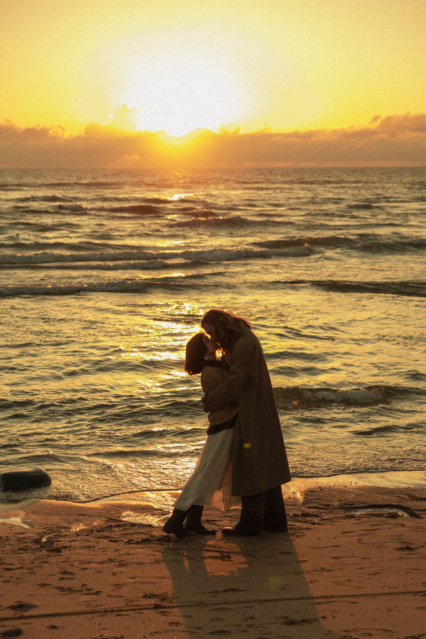 Romantic embrace by the Atlantic coast, Lisbon area