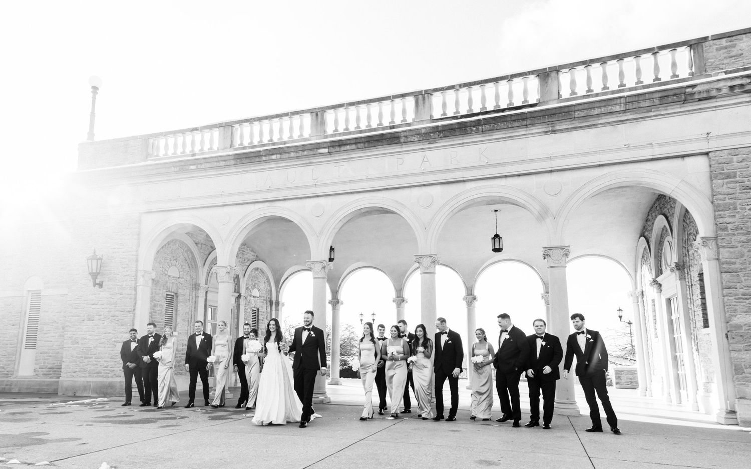 A series of black and white historical photographs showing people standing in a colonnade or covered walkway.