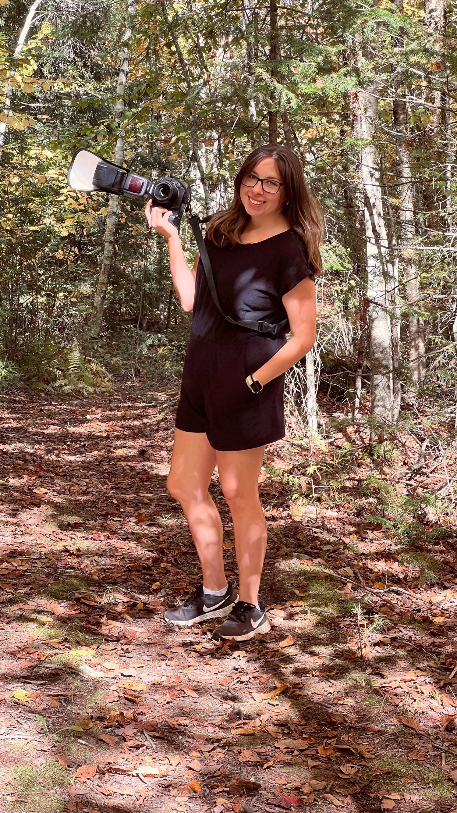 A sequence of playful poses in a wooded forest setting on a sunny day.