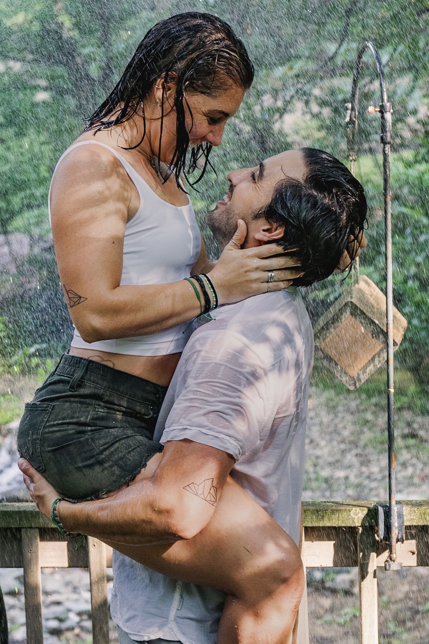 Couple sharing a close candid moment during a romantic outdoor couples photography session in Pennsylvania
