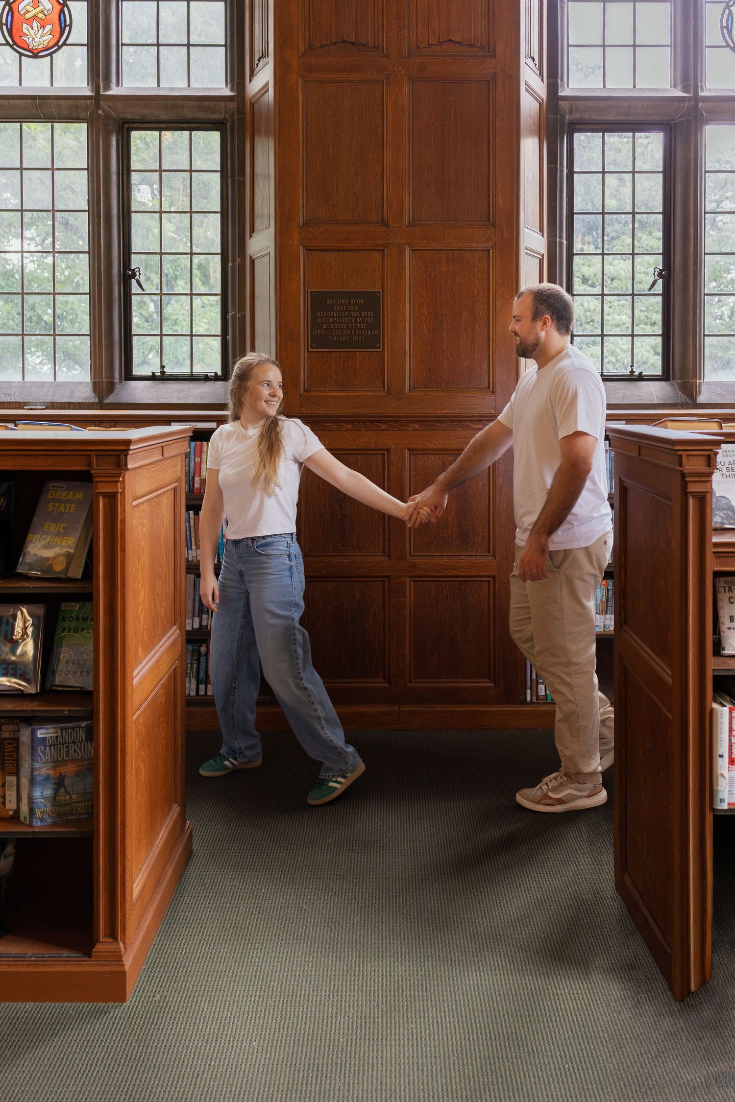 Couple sharing a quiet moment inside Linderman Library during a romantic couples photography session in Bethlehem PA