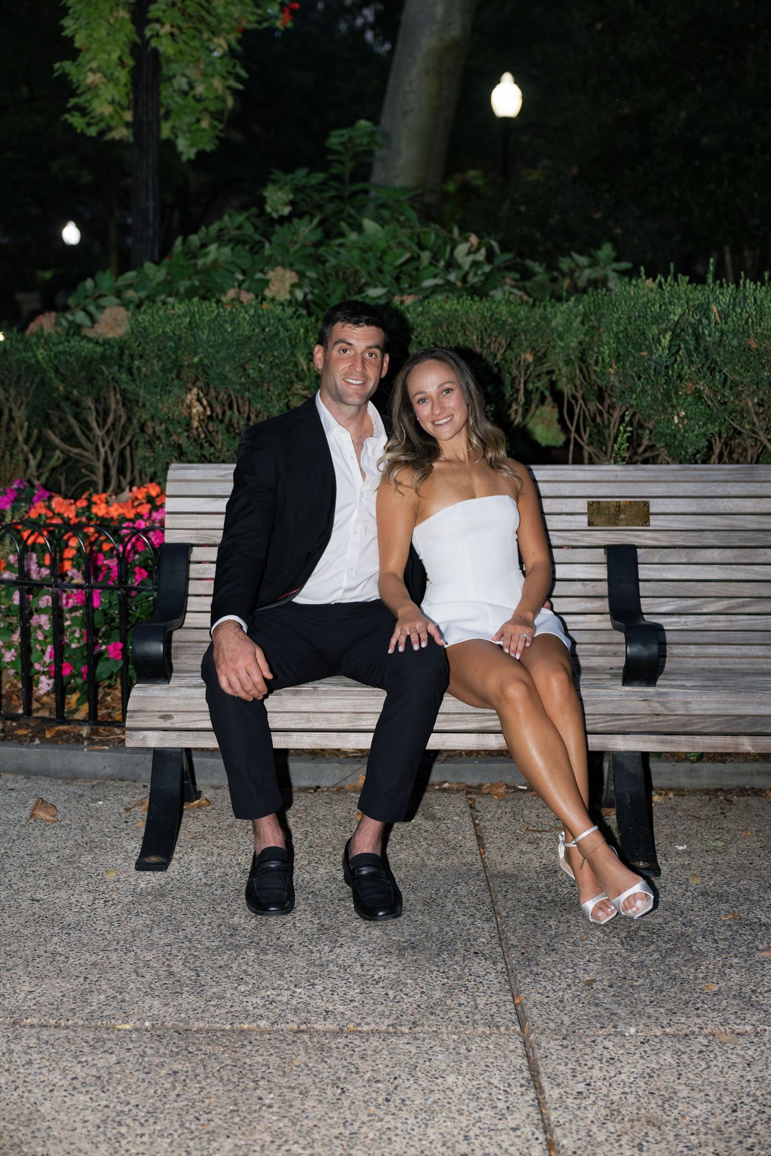 Copy
Couple sitting together on a park bench during their Rittenhouse Square engagement session in Center City Philadelphia.