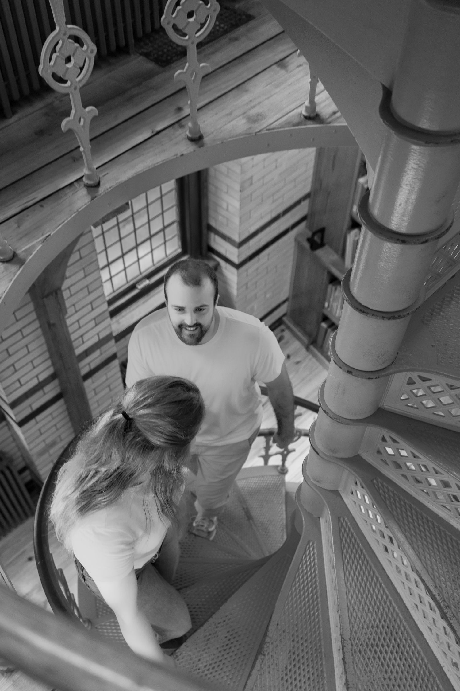 Black and white couple portrait on an ornate staircase during an editorial couples photography session in Pennsylvania at Lehigh University