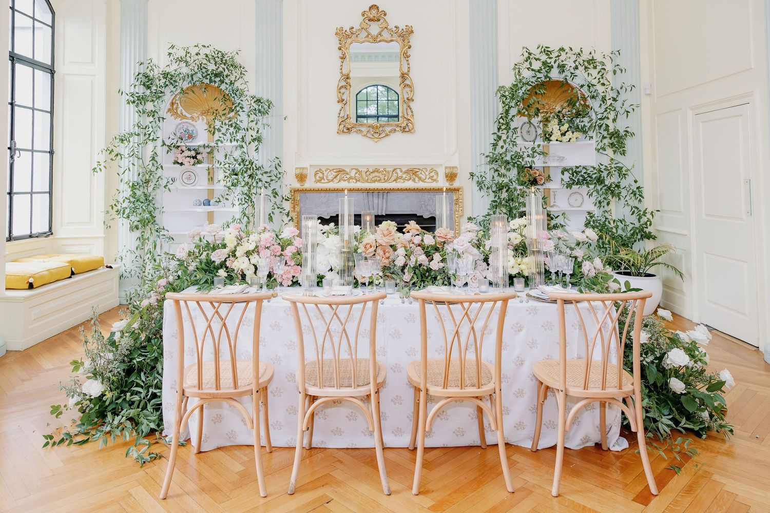 Elegant wedding reception table with garden-inspired florals inside Elkins Estate, a historic venue near Philadelphia.