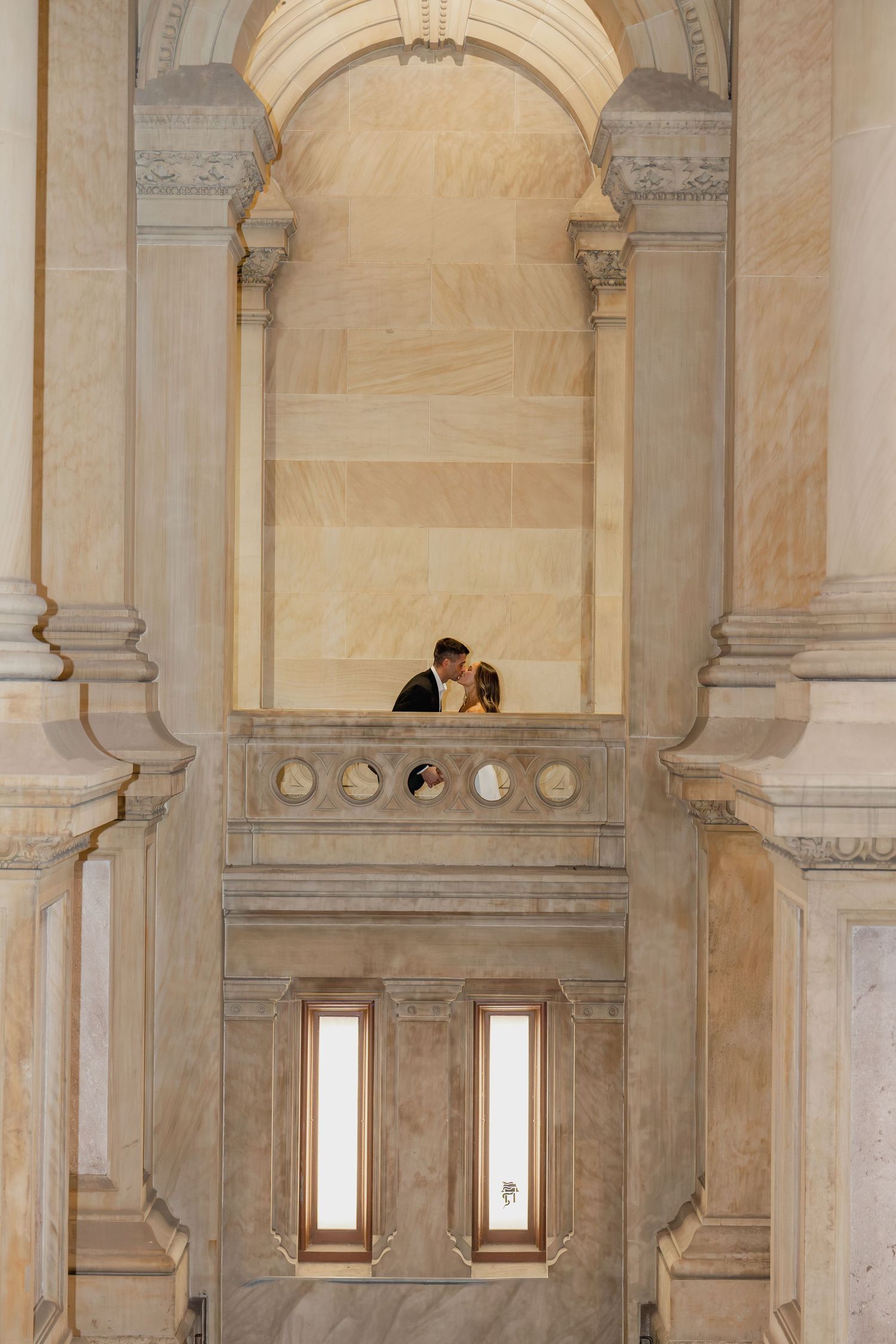 Historic stone architecture and ornate archway at Philadelphia City Hall, a popular location for editorial engagement photography.
