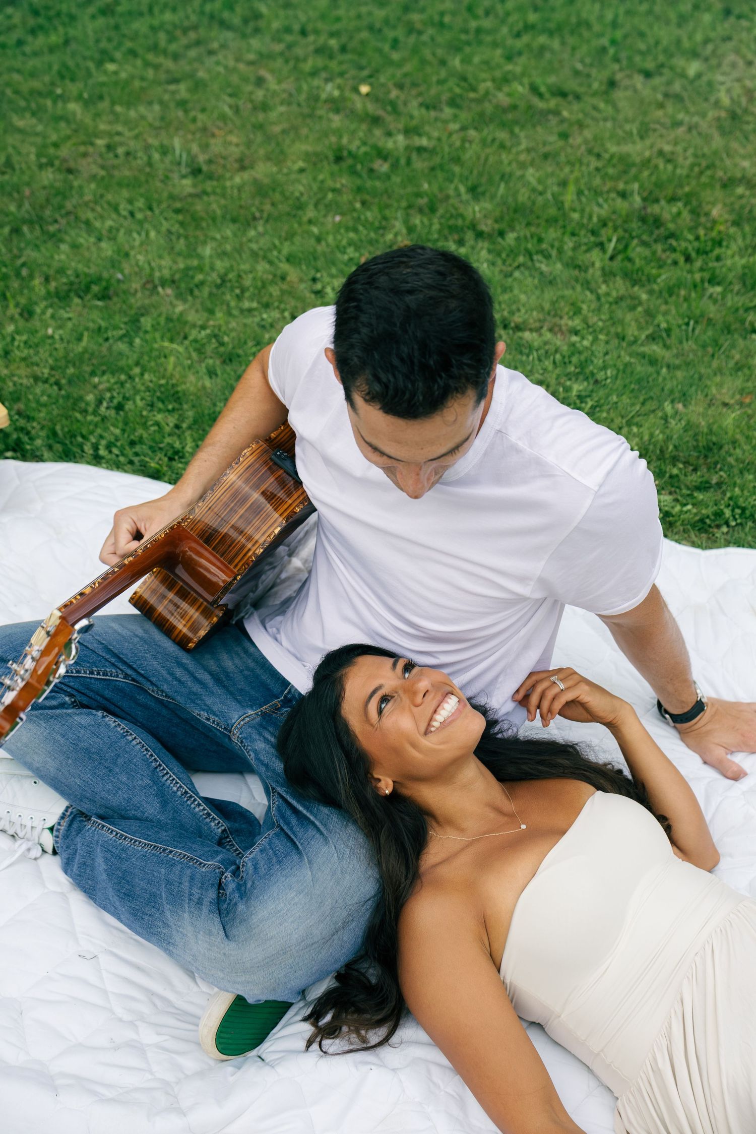 Couple relaxing together at an outdoor picnic during a romantic couples photography session in Pennsylvania
