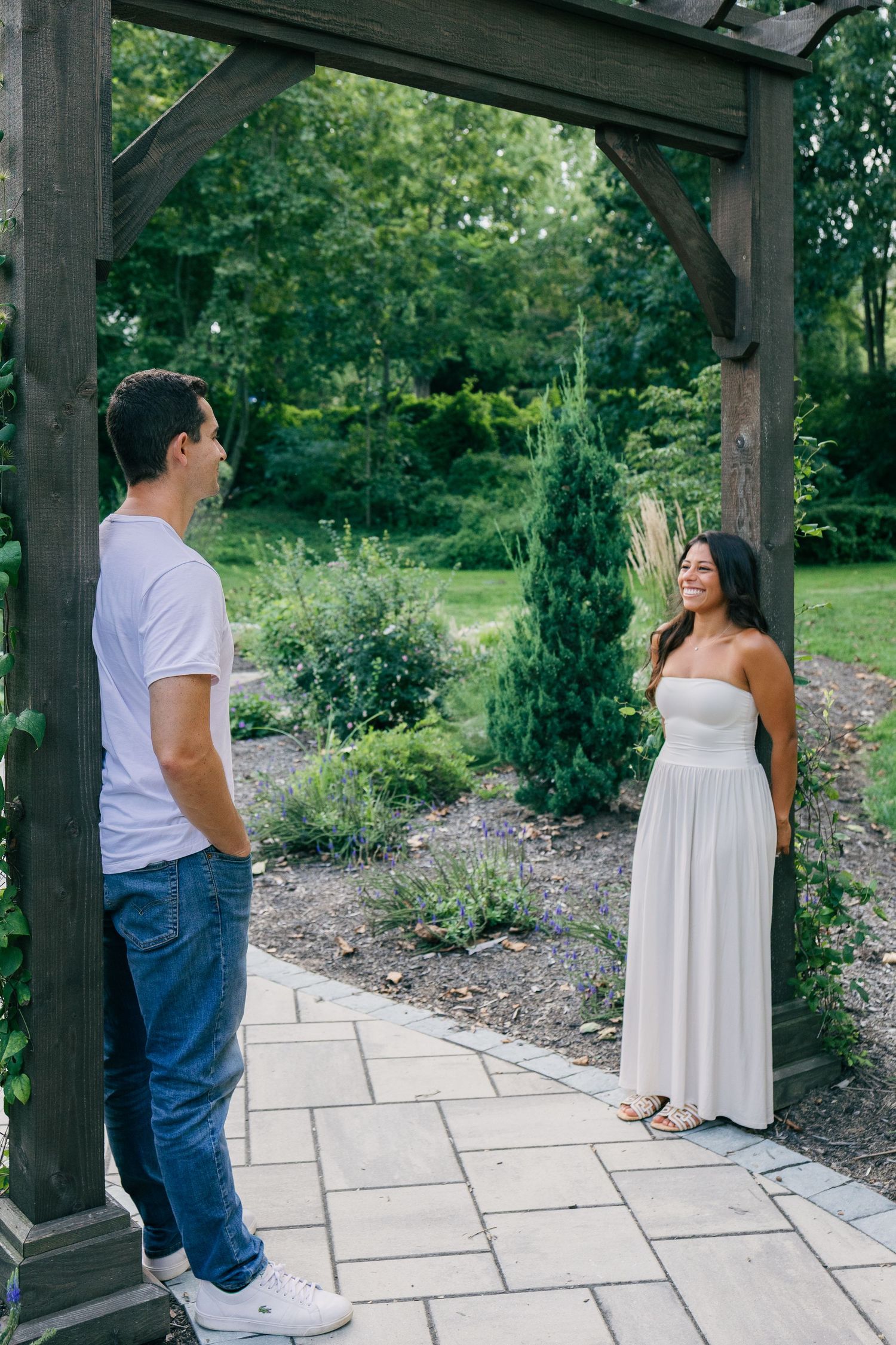 Couple sharing a candid moment during an outdoor couples photography session in Pennsylvania