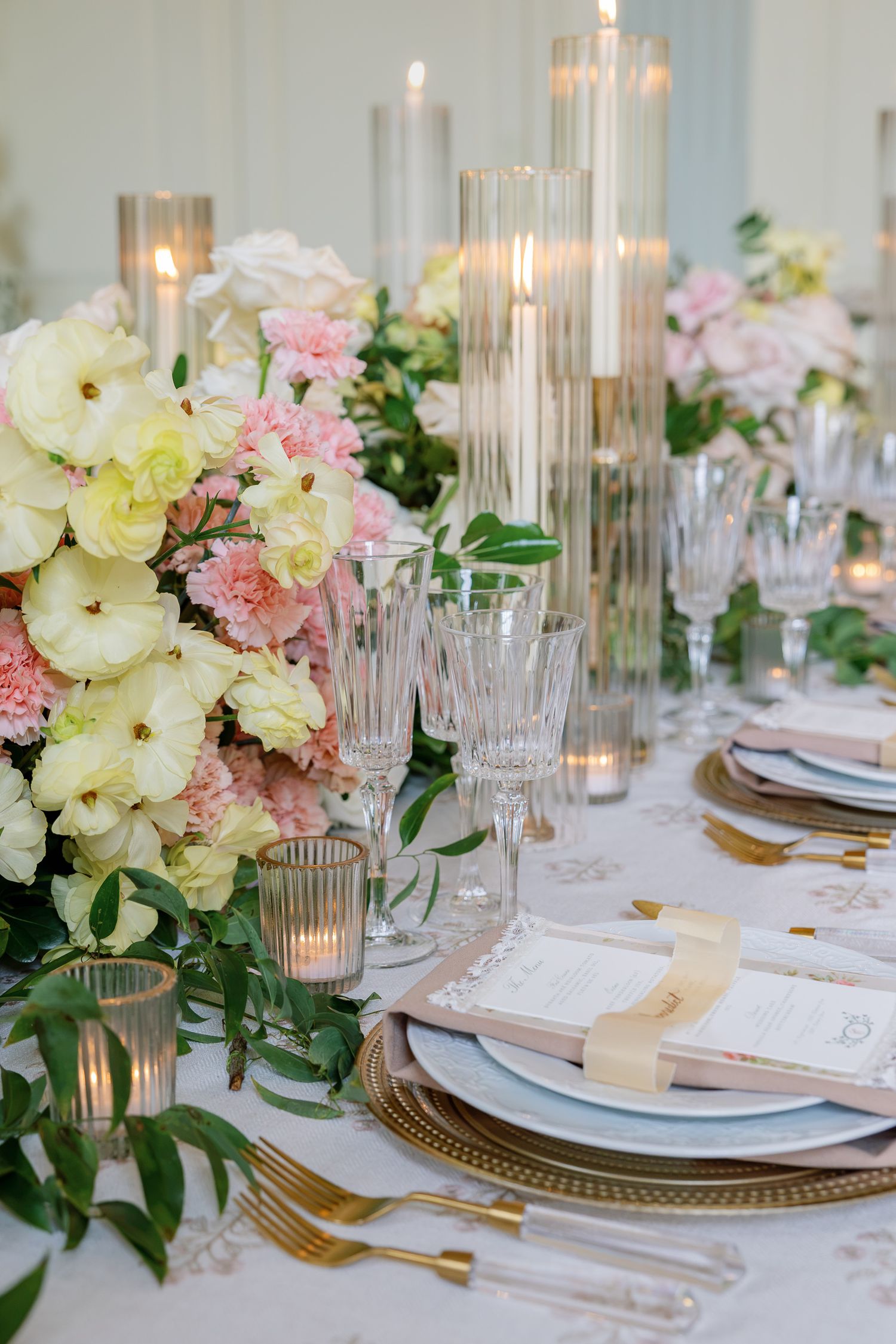 Elegant wedding tablescape with pastel florals and candles at Elkins Estate, a historic wedding venue near Philadelphia.