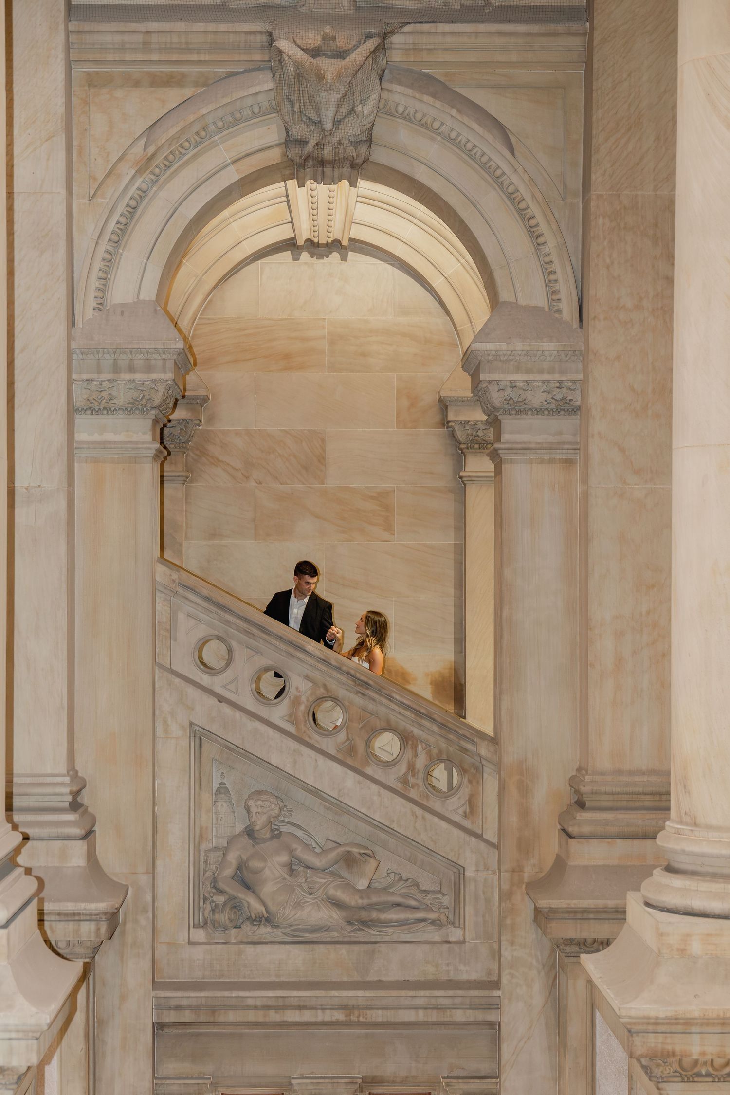 Historic staircase and architectural details inside Philadelphia City Hall, a classic location for engagement photography.