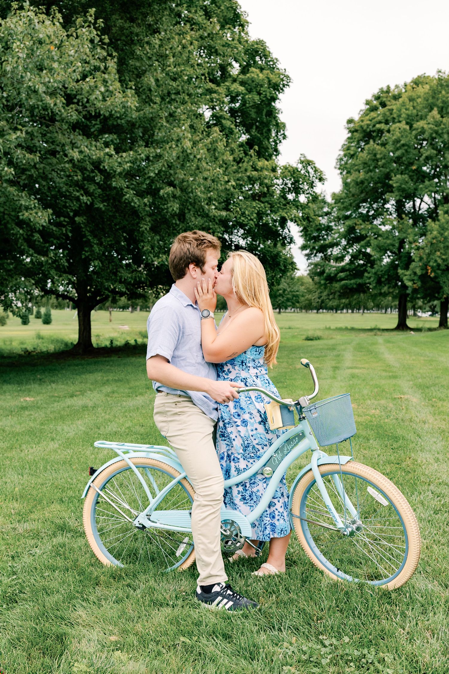Couple posing with a vintage bicycle at Greenfield Park during a romantic couples photography session in Lancaster, Pennsylvania.