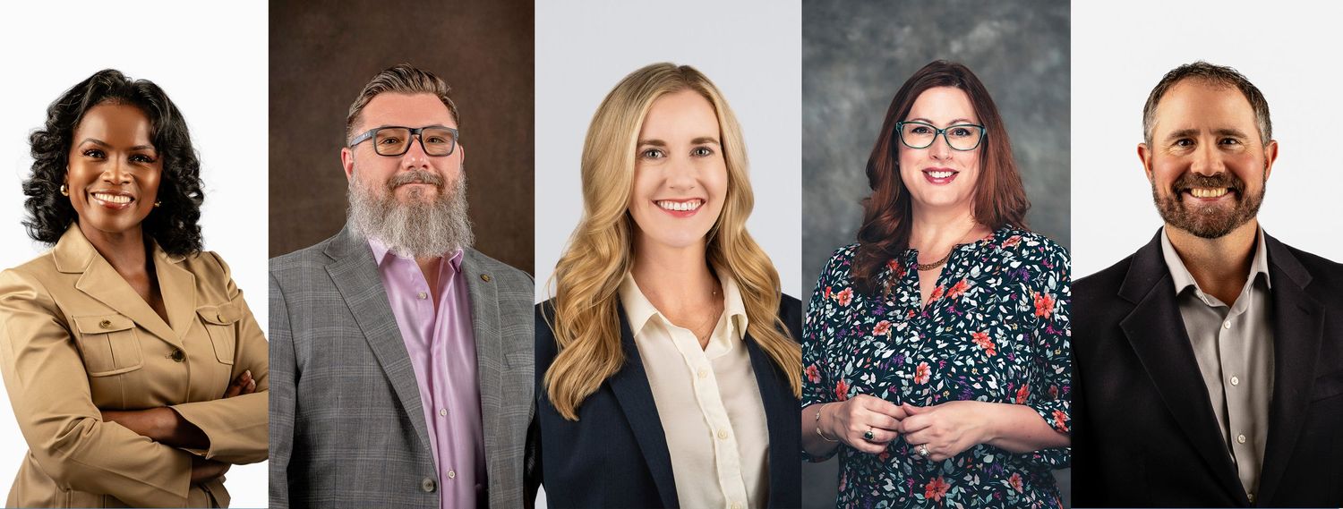 Professional headshots of five business executives posed against neutral gray background.