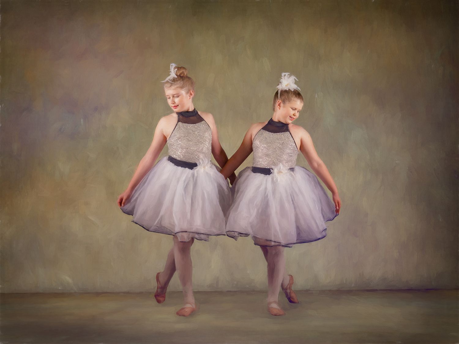 Two young ballet dancers in lavender tutus holding hands in artistic studio portrait.