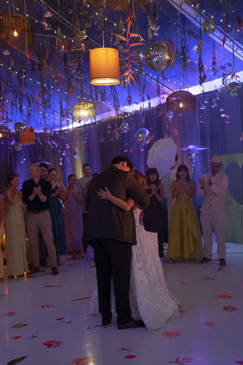 Maureen and Major embracing during their first dance at their rainforest wedding in Costa Rica.