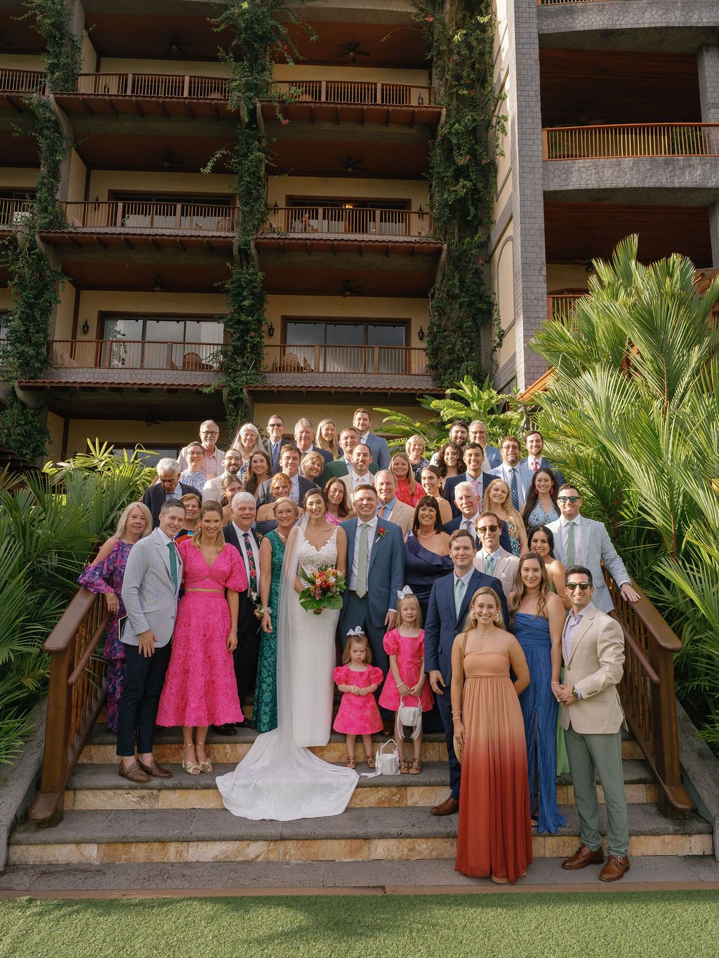 Bride and groom surrounded by family and friends at their destination wedding in Costa Rica.