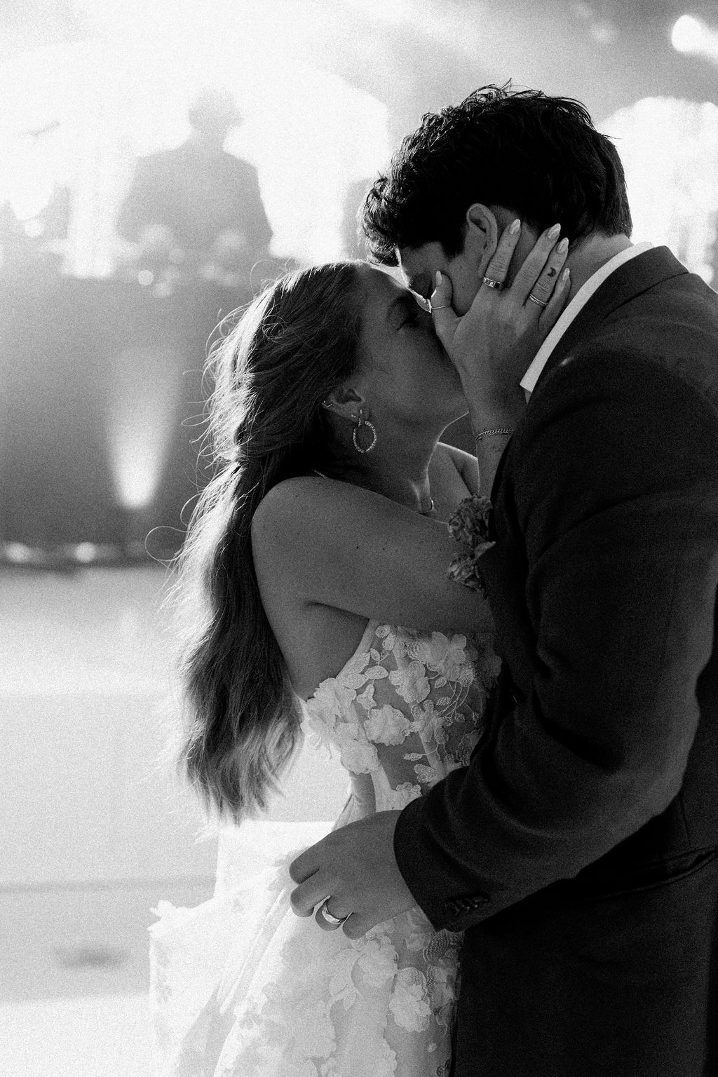 Maureen and Major kissing during their rainforest wedding reception in Costa Rica