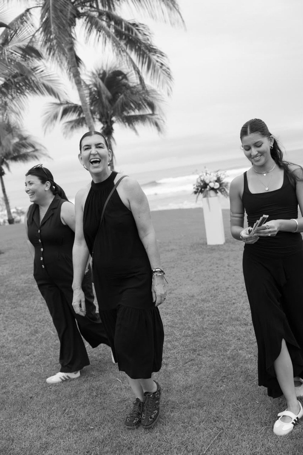 Heidy Quesada Co wedding planner and her team walking with joy on a wedding day