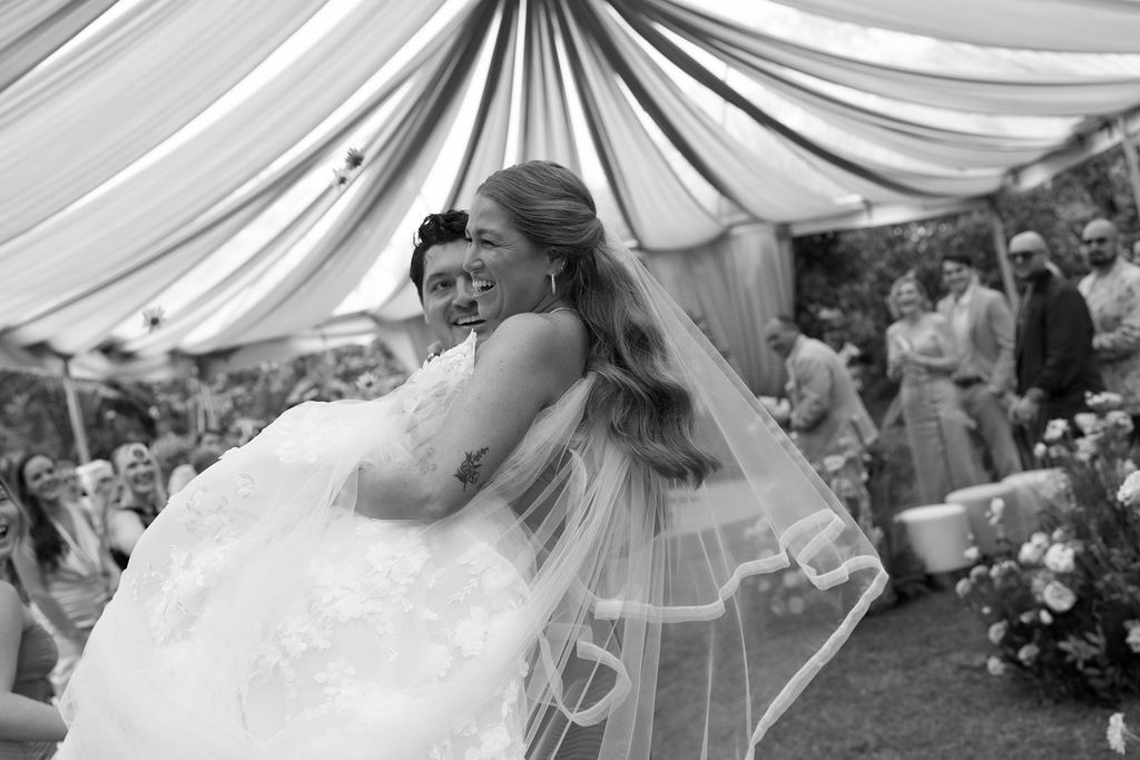 Newlyweds celebrating after their rainforest wedding ceremony in Costa Rica