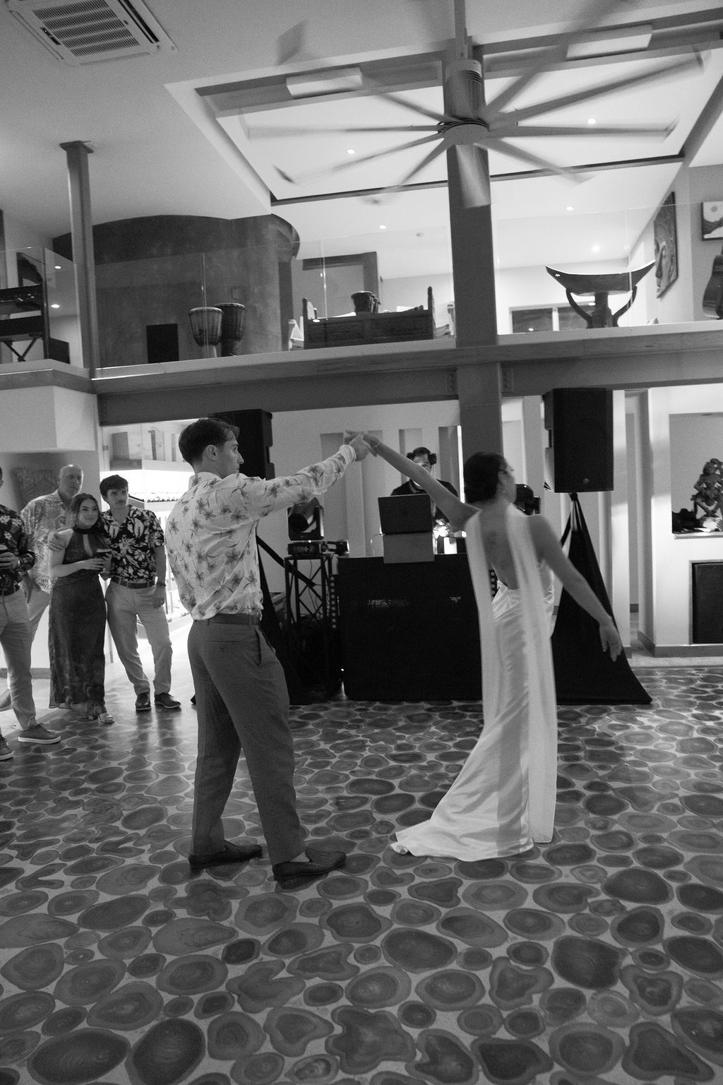 Black-and-white photograph of the couple dancing together during their wedding reception in Costa Rica.