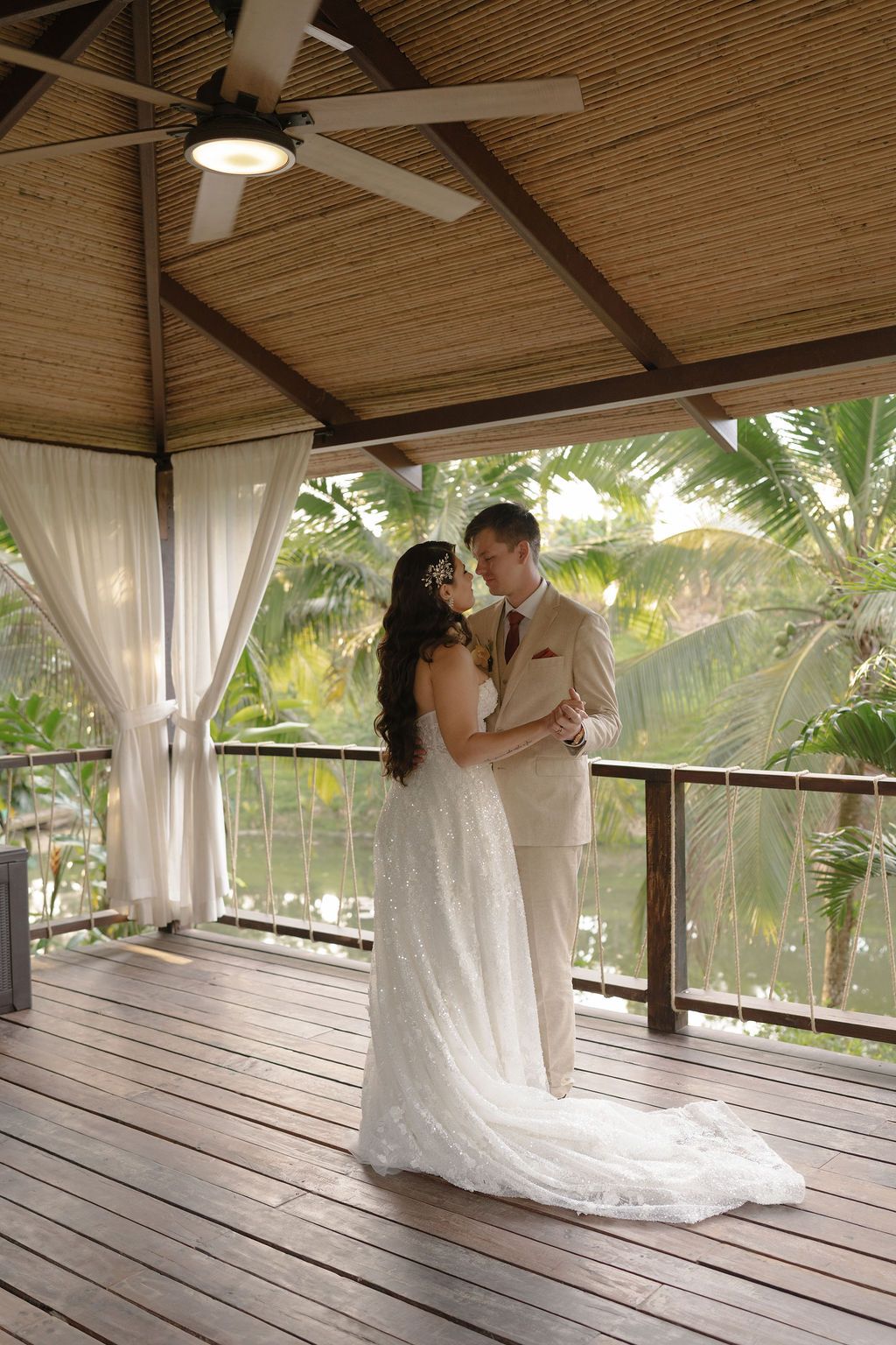 Soft candid photograph of newlyweds dancing after their Costa Rica elopement