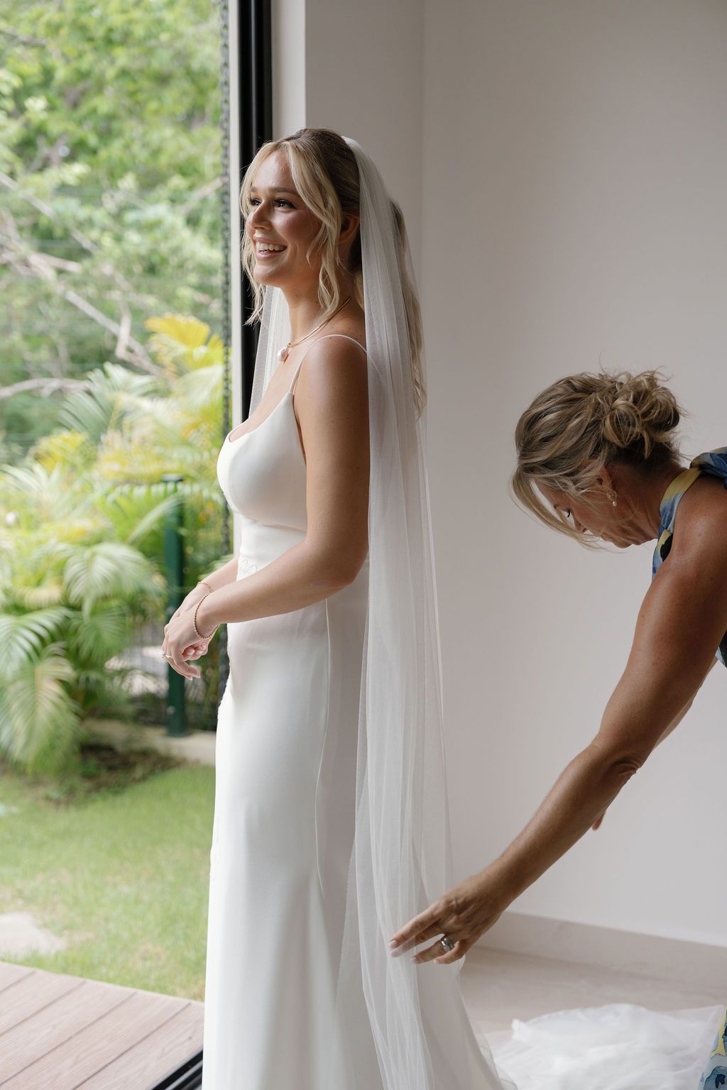 Bride getting ready before her wedding at Hacienda Pinilla in Guanacaste.